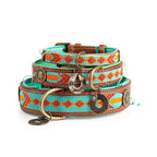 Three decorative dog collars with turquoise and brown design on a white background