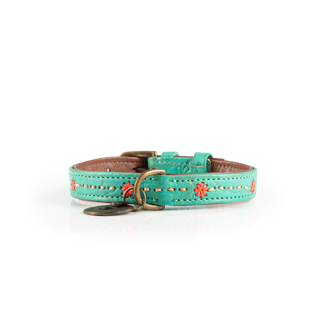 Turquoise dog collar with floral patterns on a white background