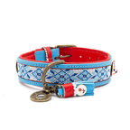 Dog collar with blue and red pattern on a white background