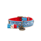 Dog collar with blue and red design on a white background