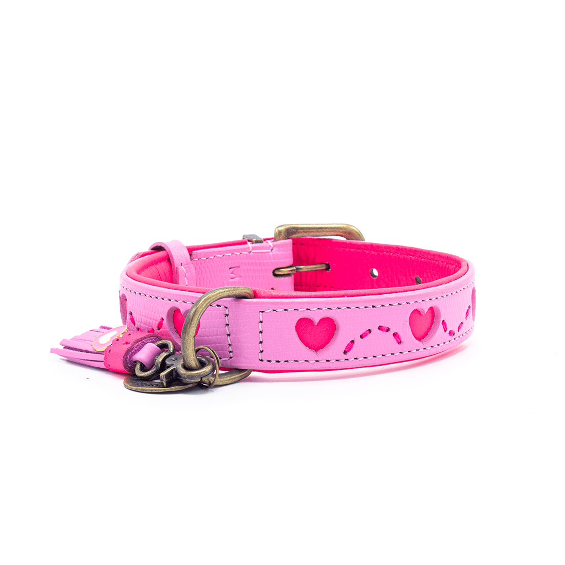 Pink dog collar with heart designs on a white background