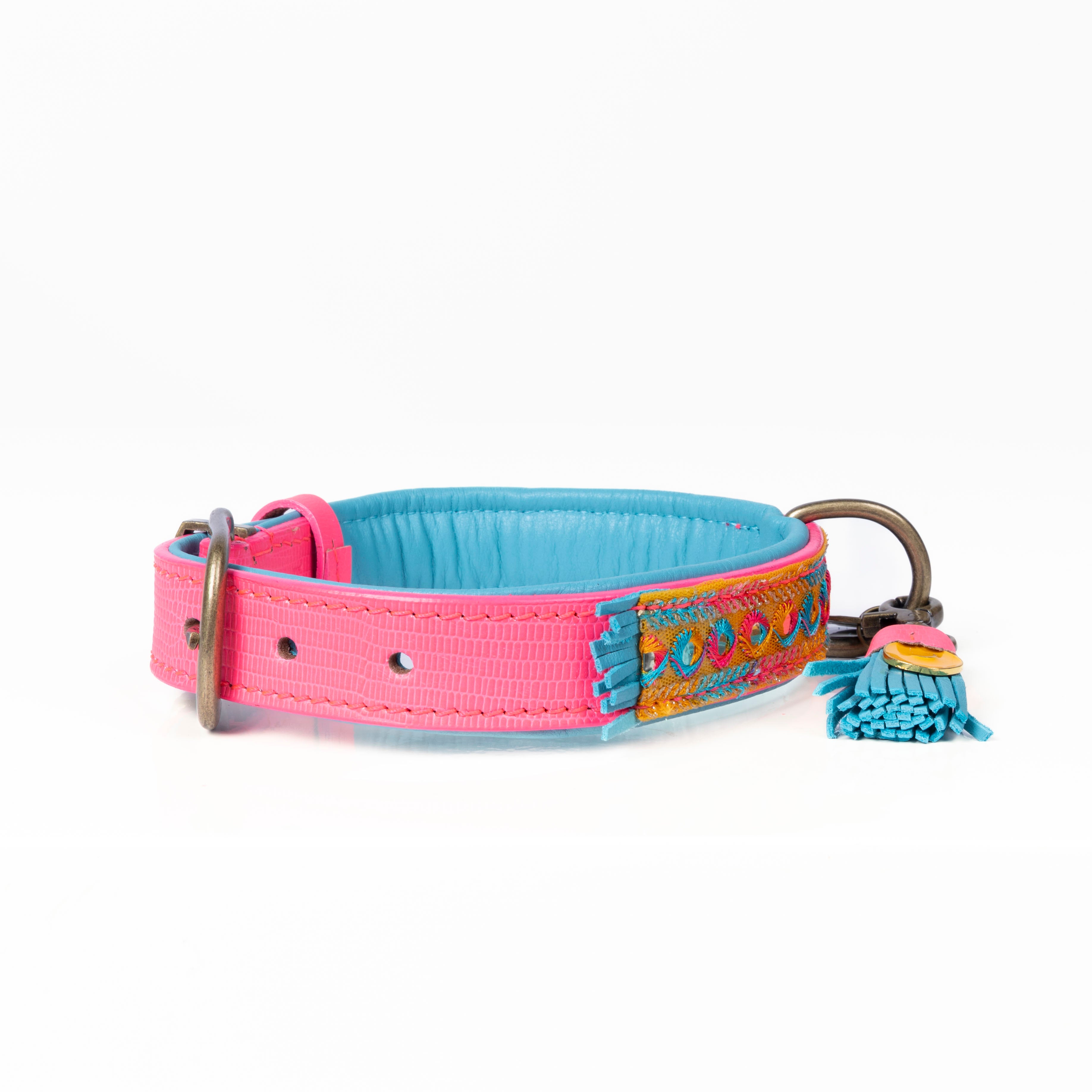 Dog collar with pink and blue straps on a white background